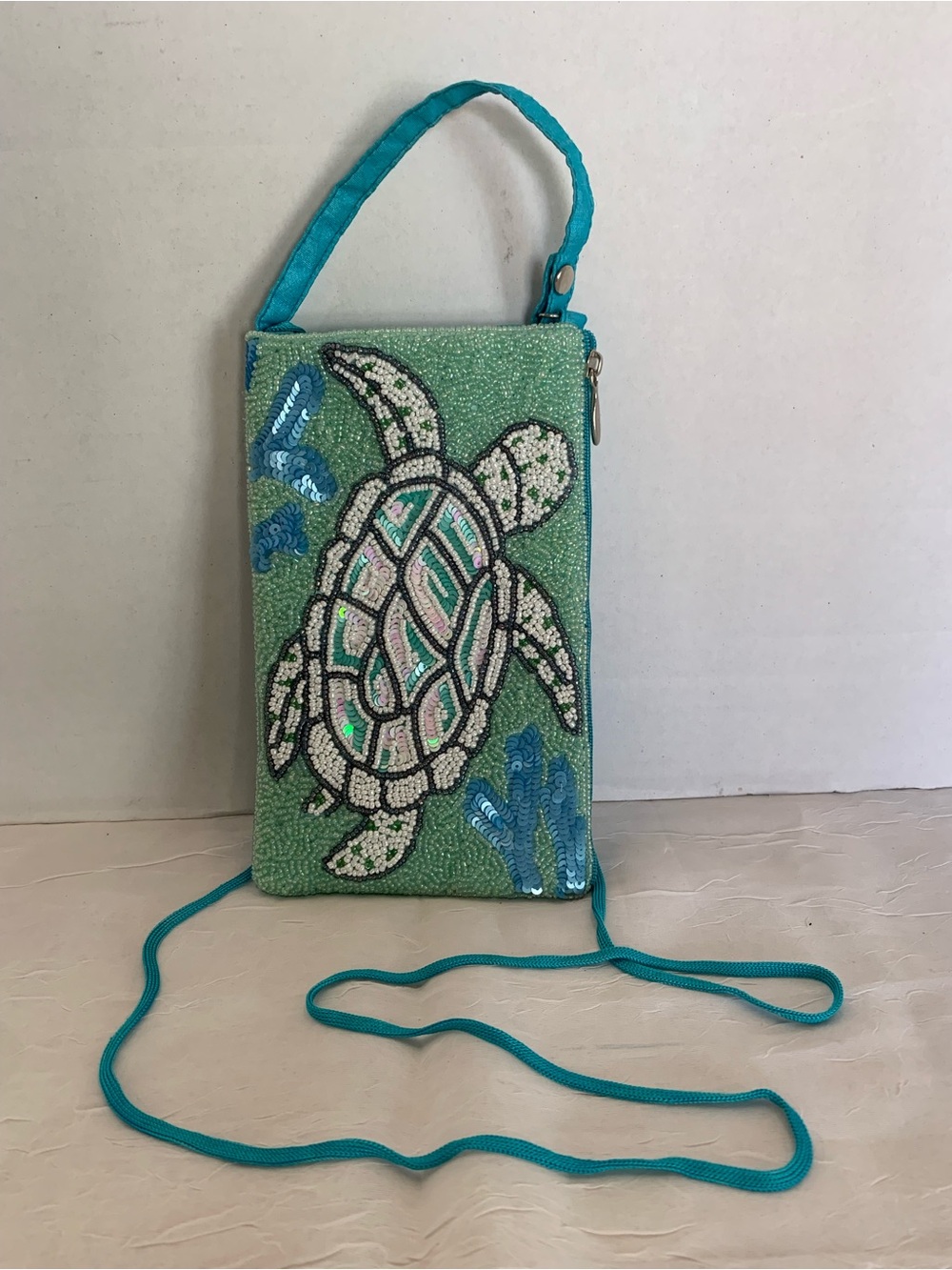 The Club Bag Turtle smartphone crossbody purse by the Bamboo Trading